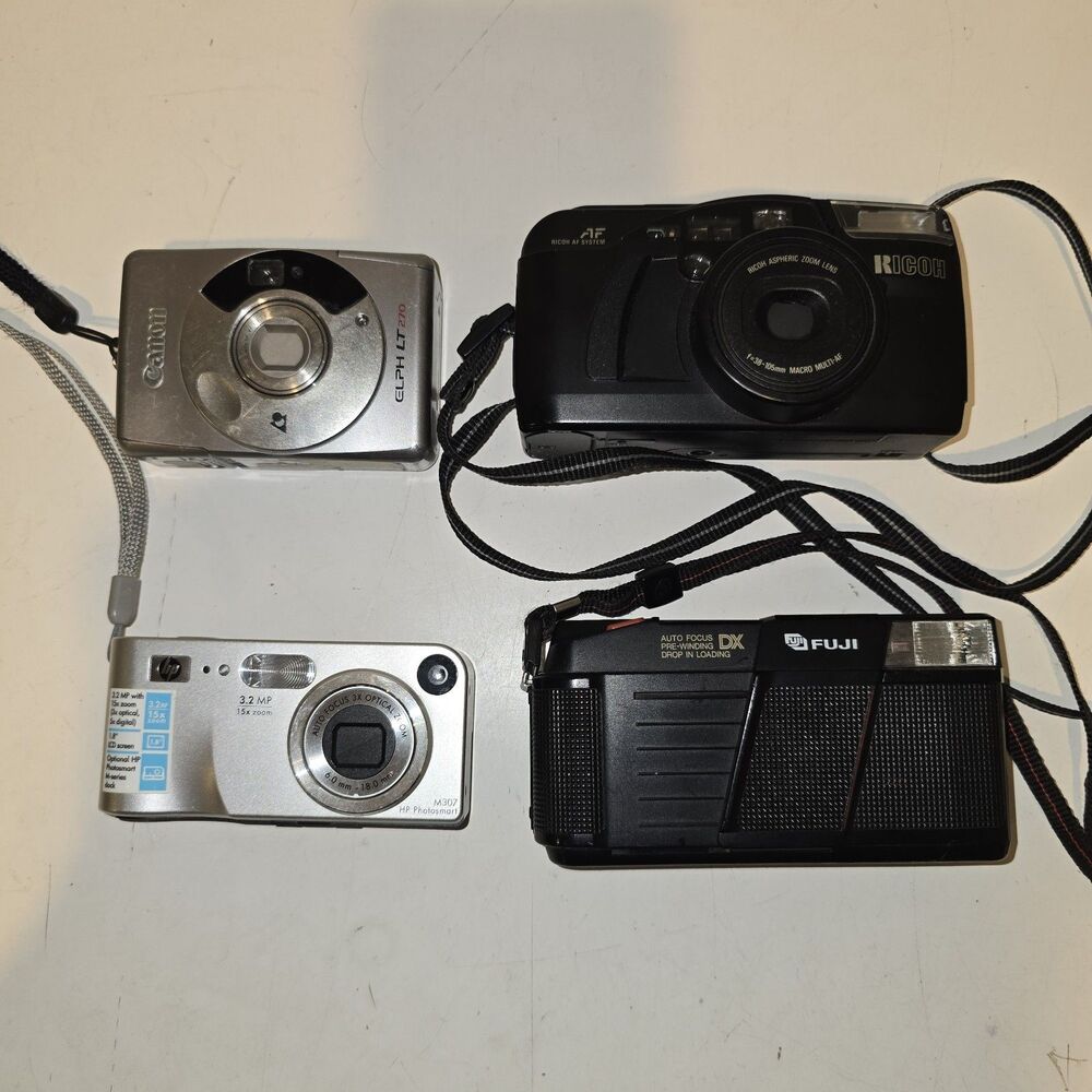 Cameras Lot Of 4 . canon Fuji Hp Ricoh-For parts or not working